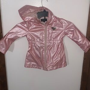 Darling little girl rain coat pink with a little heart size 4t